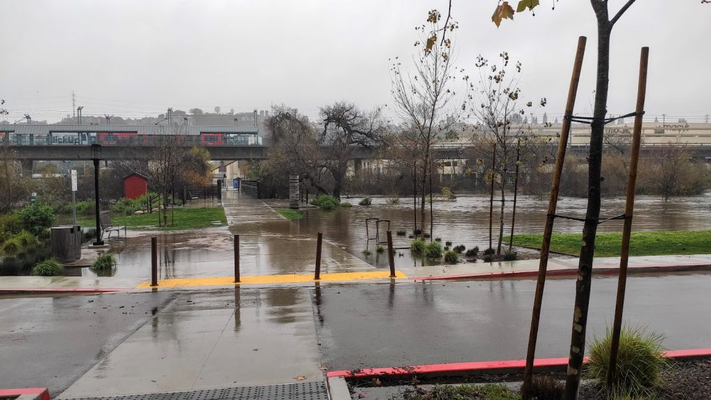 Town and Country hotel car park flooded by storm during Plant and Animal Genome conference.